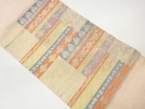 小林定織物製　引箔横段に花唐草・波模様織出し名古屋帯